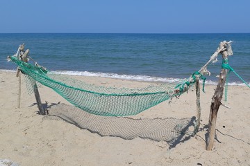 Hammock built on the beach near the sea