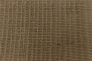 Abstract texture of wet glue layer. Pattern of dry putty cover. Grunge background  of thermal mortar on house wall. Plastering slabs of mineral wool (rockwool, cotton) insulation with mesh and glue