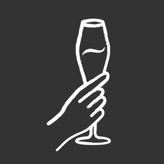 Hand holding tulip glass of wine chalk icon. Champagne flute. Glassful of alcohol drink. Wine service. Celebration, party. Wedding. Cheers. Degustation. Isolated vector chalkboard illustration