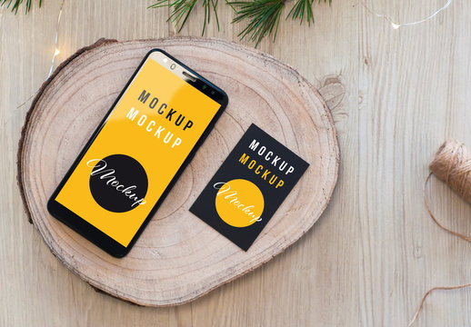 Black Vertical Tablet and Mobile on Wood Slice Top View Mockup