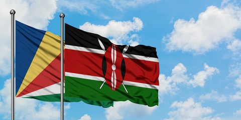 Seychelles and Kenya flag waving in the wind against white cloudy blue sky together. Diplomacy concept, international relations.