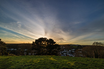 Fototapeta na wymiar Sunset over West Looe Cornwall from the wooldown Looe
