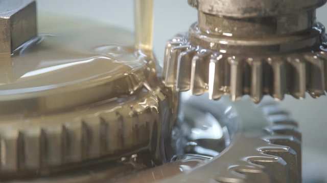 The process of processing metal billets in old machine tools of heavy engineering plants. Moving parts of processing machines