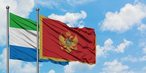 Sierra Leone and Montenegro flag waving in the wind against white cloudy blue sky together. Diplomacy concept, international relations.