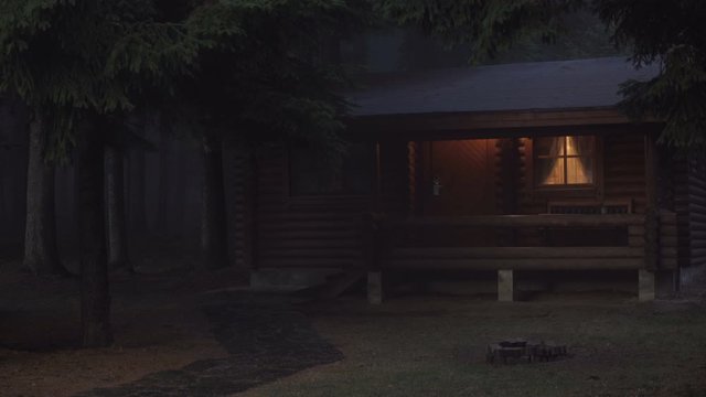 Cabin in the misty woods. Evergreen forest with fog