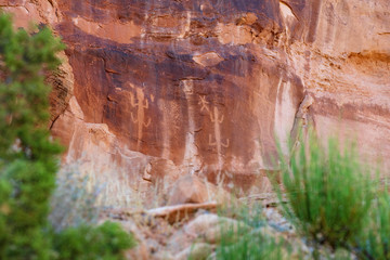 Detail of a part of the petroglyphs incised by the Fremont People in the sandstone rock face at Dinosaur National Monument, Utah