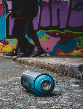 Graffiti Spray Can On The Ground