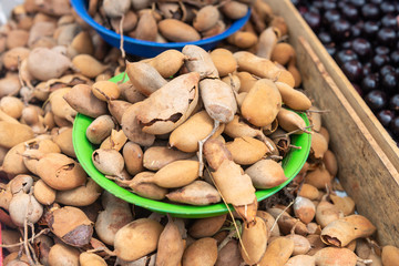 Basket with tamarind piled at the street market