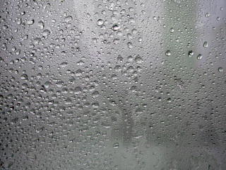 Frozen glass. Water drops