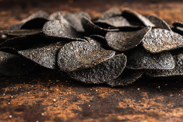 background of many black chips with spices