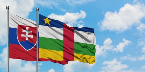 Slovakia and Central African Republic flag waving in the wind against white cloudy blue sky together. Diplomacy concept, international relations.