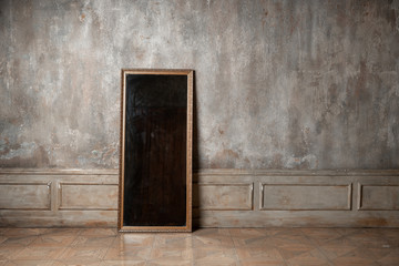 The mirror on the background of vintage wall