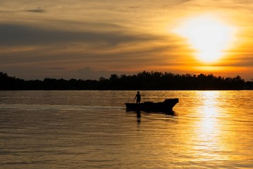 sunset and the boat silhouette