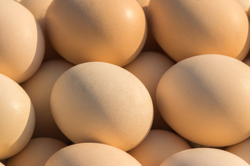 Brown chicken eggs laid out on the counter of the market, store, supermarket