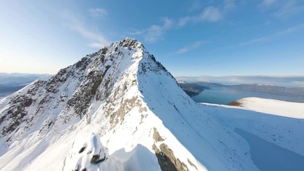 Aerial View of Mountain Covered in Snow