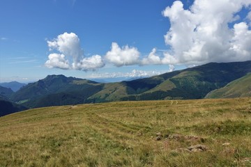 Fototapeta premium Typical mountain landscape from the pastures
