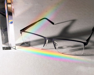 glasses with cristal prism and rainbow