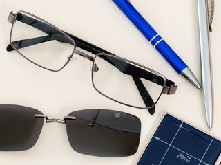 eyeglasses with pen and clip on