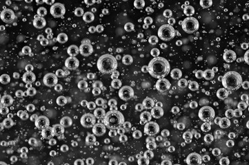 Black and white Small and Large Oxygen Bubbles in Liquid