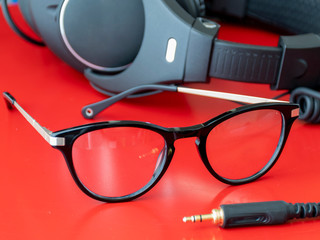 glasses and headphones