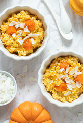 Pumpkin millet kasha with coconut flakes