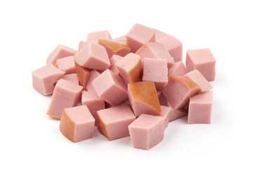 Sliced boiled sausage, cut by cubes, ingredients, isolated on white background