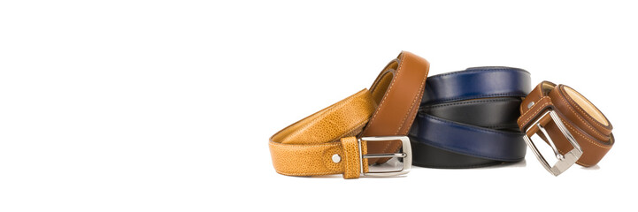 Many kinds of belts isolated on white.