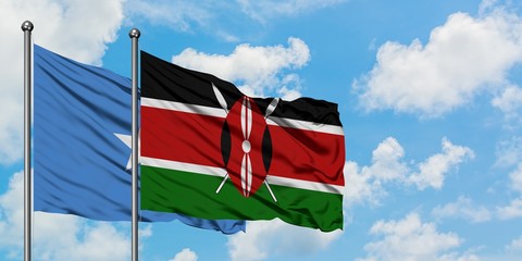 Somalia and Kenya flag waving in the wind against white cloudy blue sky together. Diplomacy concept, international relations.