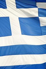 Close-up of flag of Greece waving in bright sun