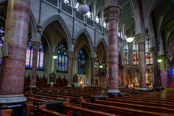 Obraz premium DUBLIN, IRELAND, DECEMBER 21, 2018: Interior of Church of St. Augustine and St. John, commonly known as John's Lane Church, a large Roman Catholic Church located on Thomas Street.