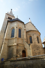 Fototapeta na wymiar Church of beige brick with large windows in Prague, Czech Republic.