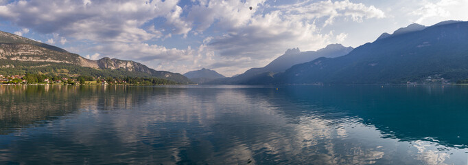 panorama of lake annecy in the morning with cloudy sky