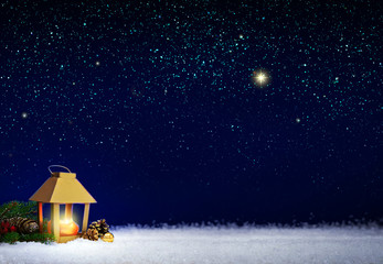 Christmas lantern on white snow and stars sky .