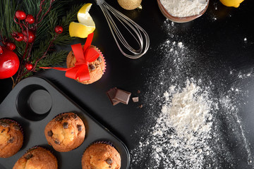 Muffins for the holiday season on black table top