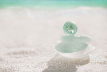 blue sea glass with white sand beach - 301260183