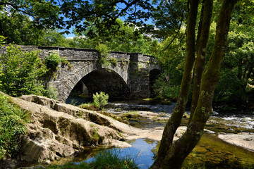 Fototapeta na wymiar Skelwith Bridge over the River Brathay in Skelwith Bridge village Lake District National Park England