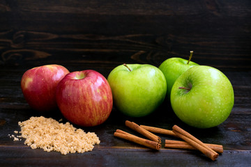 Red and Green Apples with Cinnamon Sticks and Brown Sugar