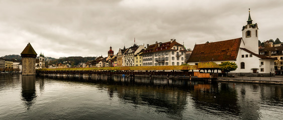 Panorama of Lucerne historic city center view of famous Chapel Bridge and lake Vierwaldstattersee, Canton of Lucerne, Switzerland