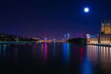 Fototapeta na wymiar River Thames by night long exposure.