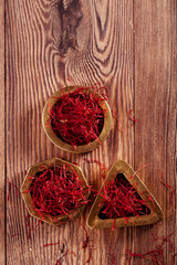 saffron threads  pile with vintage wood backdrop