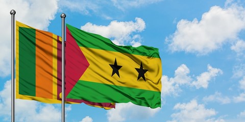 Sri Lanka and Sao Tome And Principe flag waving in the wind against white cloudy blue sky together. Diplomacy concept, international relations.