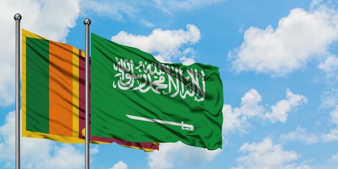 Sri Lanka and Saudi Arabia flag waving in the wind against white cloudy blue sky together. Diplomacy concept, international relations.