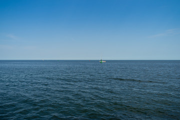 Fototapeta premium Beautiful seascape. Different colors of sea and sky. Nautical background.