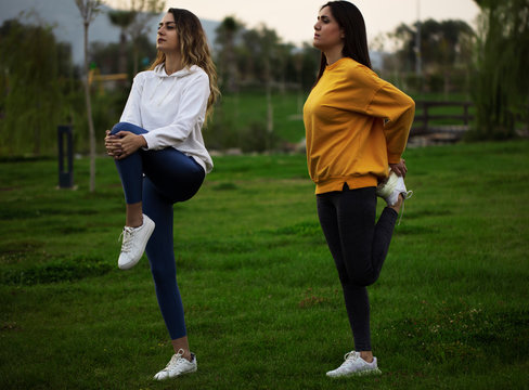 two girls doing sports in the park