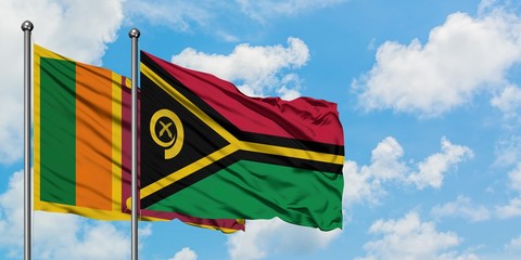 Sri Lanka and Vanuatu flag waving in the wind against white cloudy blue sky together. Diplomacy concept, international relations.