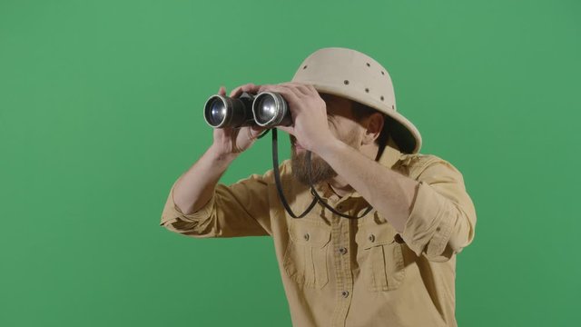 Adult Man Explorer Looking Through Binoculars