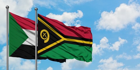 Sudan and Vanuatu flag waving in the wind against white cloudy blue sky together. Diplomacy concept, international relations.
