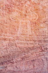 Detail of a part of the petroglyphs incised by the Fremont People in the sandstone rock face at Dinosaur National Monument, Utah
