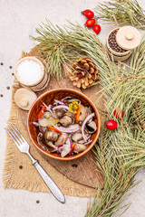 Pickled (fermented) mushrooms. Traditional New Year (Christmas) snack. Festive table cutlery setting