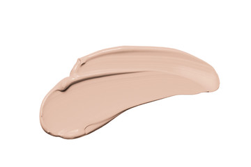 Makeup foundation, beige concealer swatch smudge smear isolated on white background. BB CC cream...